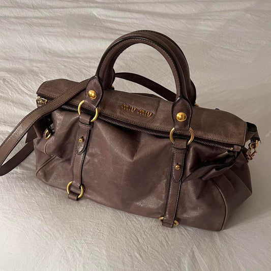 Authentic Grey Looks A Bit Purple In Person Miu Miu Vitello Leather Bow Bag With Gold Hardware And Removable Strap🤎🌆