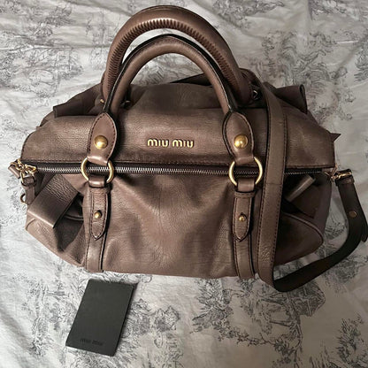Authentic Miu Miu Purple Grey Leather Vitello Lux Bow Bag In Gold Hardware With Removable Strap🤎🌆