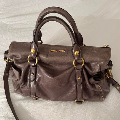 Authentic Grey Looks A Bit Purple In Person Miu Miu Vitello Leather Bow Bag With Gold Hardware And Removable Strap🤎🌆